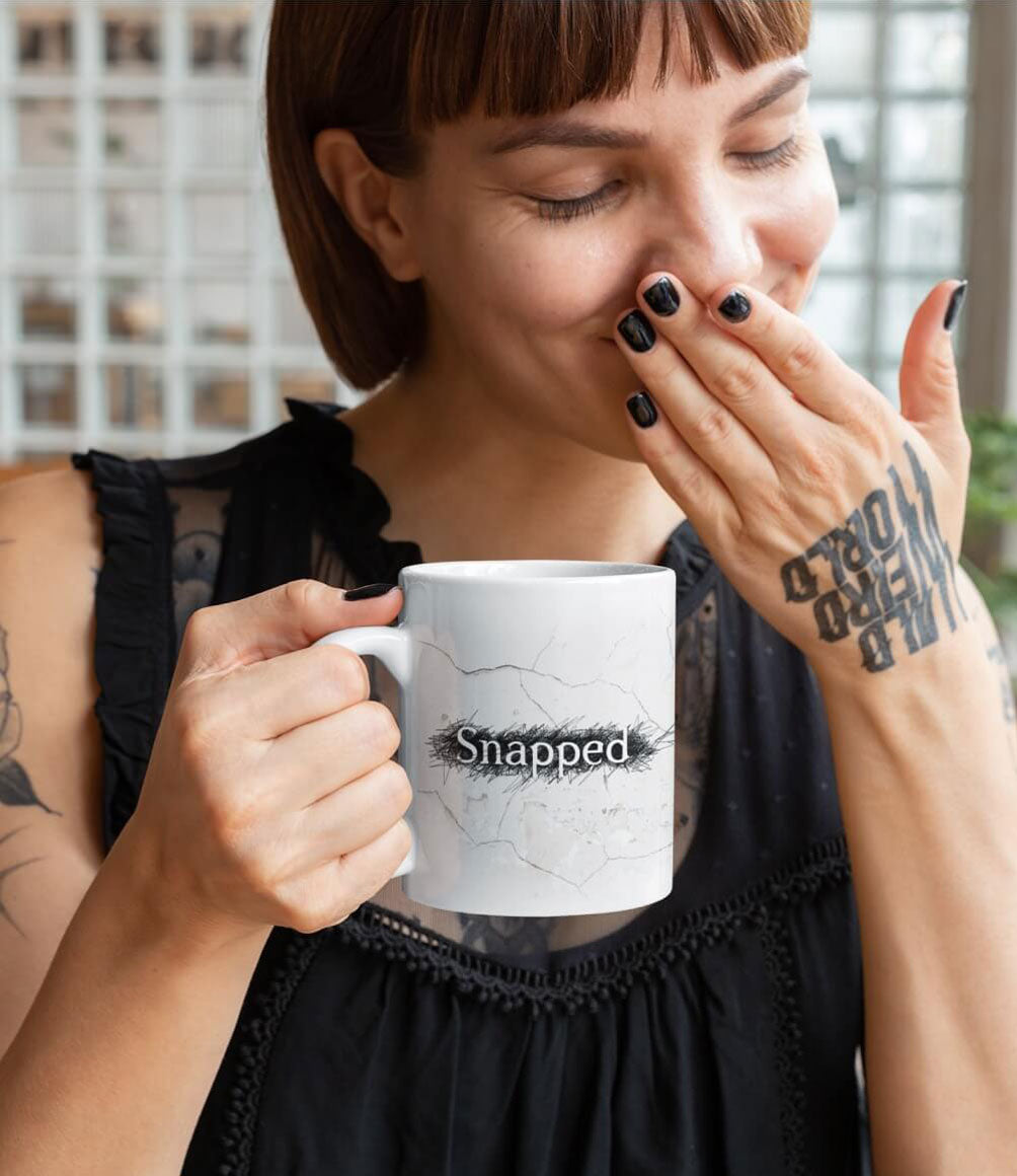 Link to /products/snapped-logo-cracked-white-mug