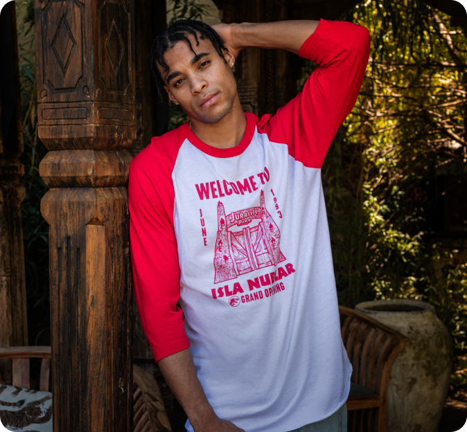 Link to /products/jurassic-park-30th-anniversary-welcome-to-isla-nublar-unisex-raglan