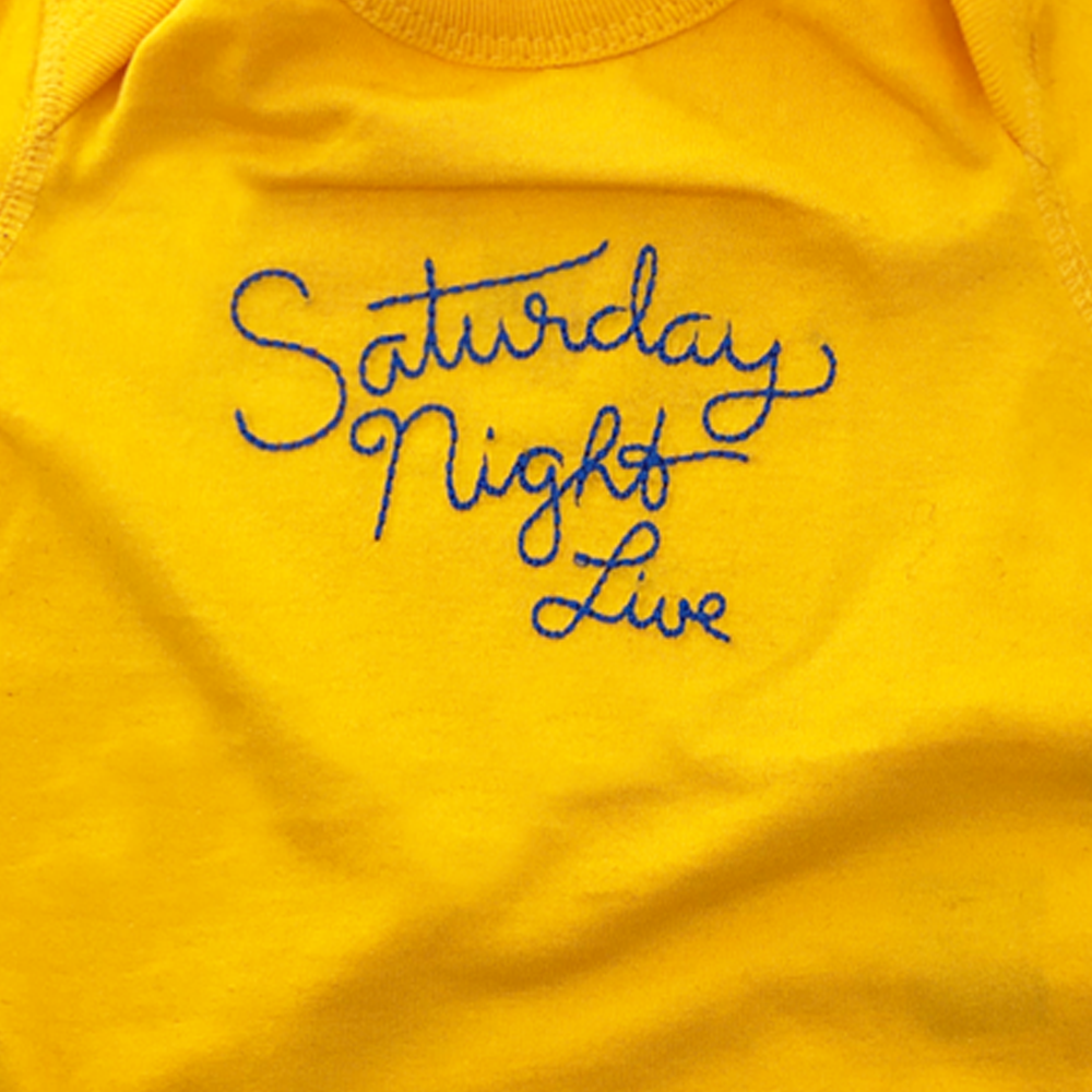 Saturday Night Live Stitched Logo Baby Bodysuit